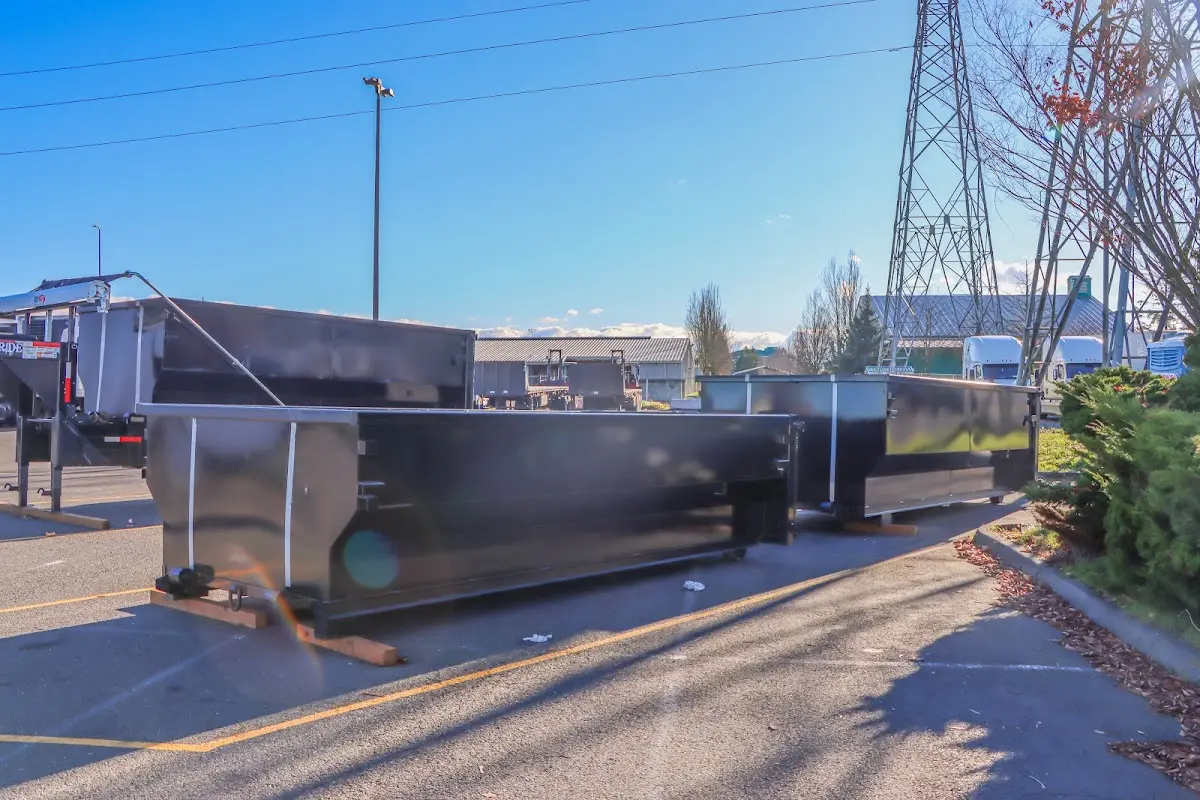 Roll-off dumpster ready for waste disposal at job site for 12 Yard Dumpster Rental in Lincoln
